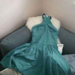 Turquoise halter style fit and flare dress